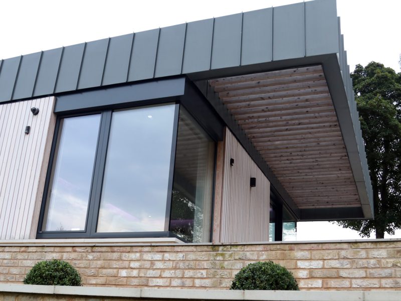 HF 410 windows Studio, HS 330 Lift & Slide Door with Glass-to-Glass Corner in Timber-Aluminium