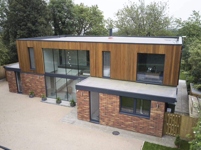 KS 430 Lift & Slide Doors, KF 410 Windows (all in uPVC-Aluminium), HX300 Panorama Glazing, AT 540 Aluminium Entrance Door, Raffstore External Shading