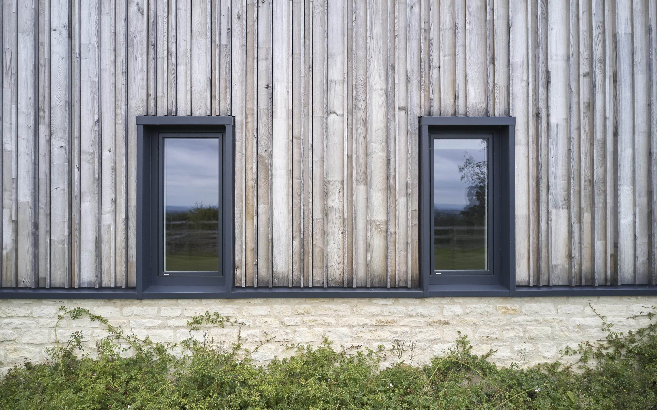 What are the benefits of uPVC alu clad windows over aluminium windows?