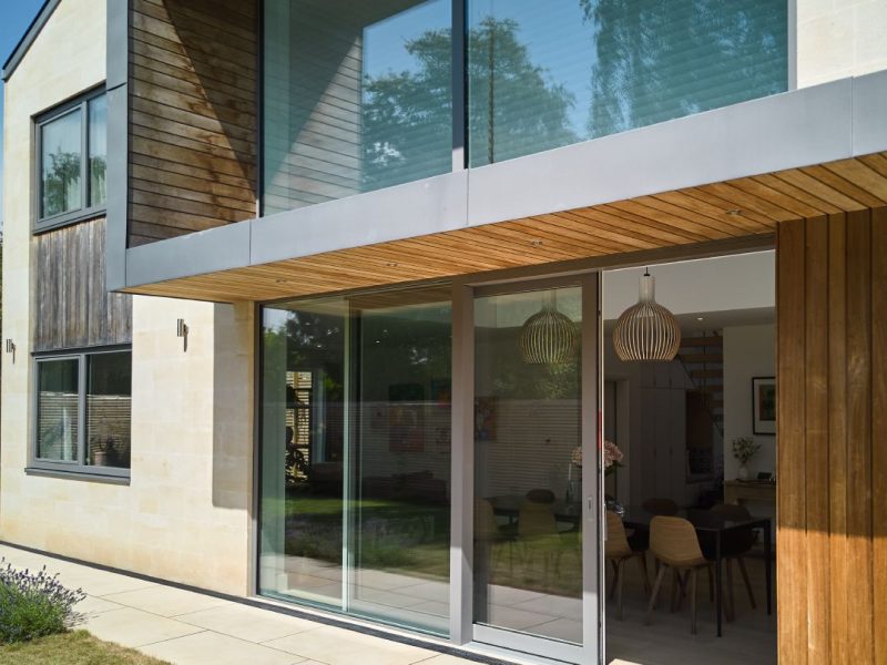 HS 330 Timber-Aluminium Lift & Slide Door with fixed glazing