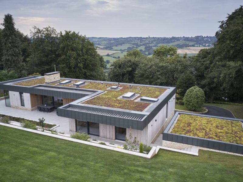 HF 410 windows, HS 330 lift & slide doors with glass-to-glass corner in Timber-Aluminium