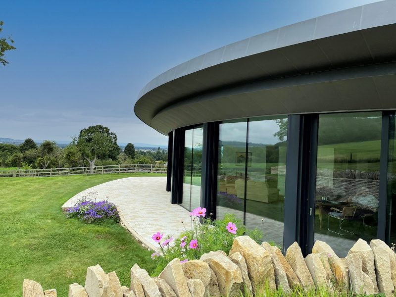 HF 410 Windows, HS 330 Lift & Slide Doors, HX 300 Panorama Fixed Glazing with glass joints, AT 540 Aluminium Entrance Door