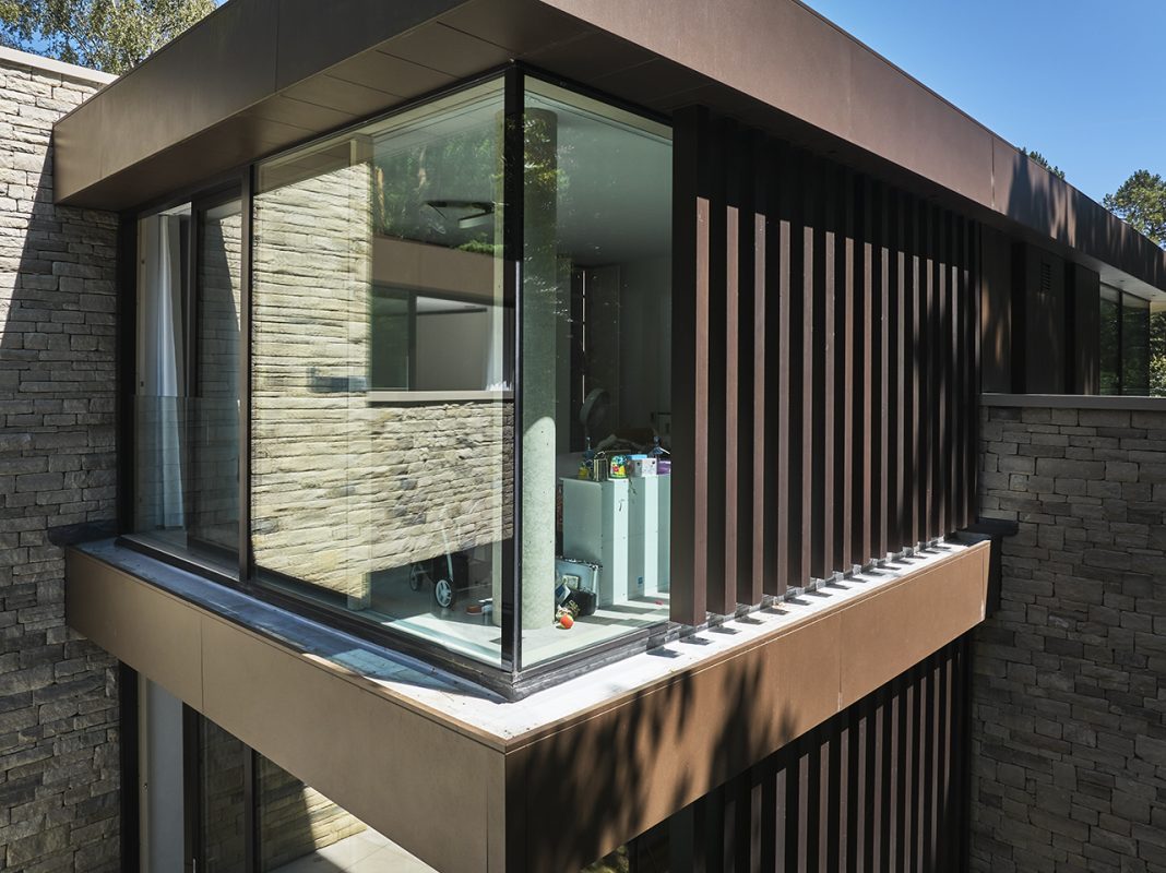 Glass-to-Glass Corner with Large Lift & Slide Door and Juliette Balcony
